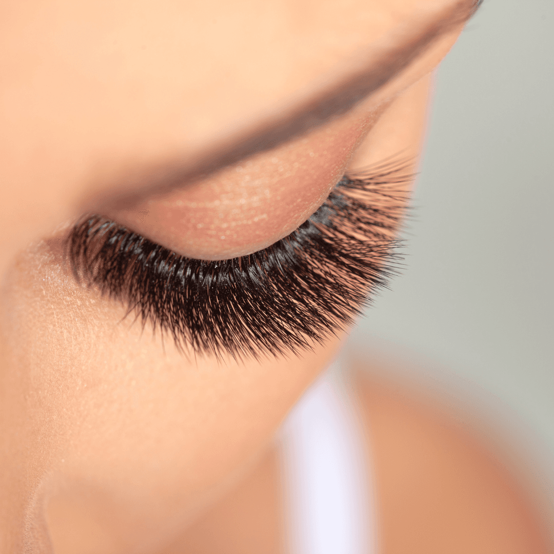 Close-up of a closed eye with full Russian eyelash extensions – expert lash and brow treatments at Merluza Hair & Beauty in Hall Green, Birmingham.